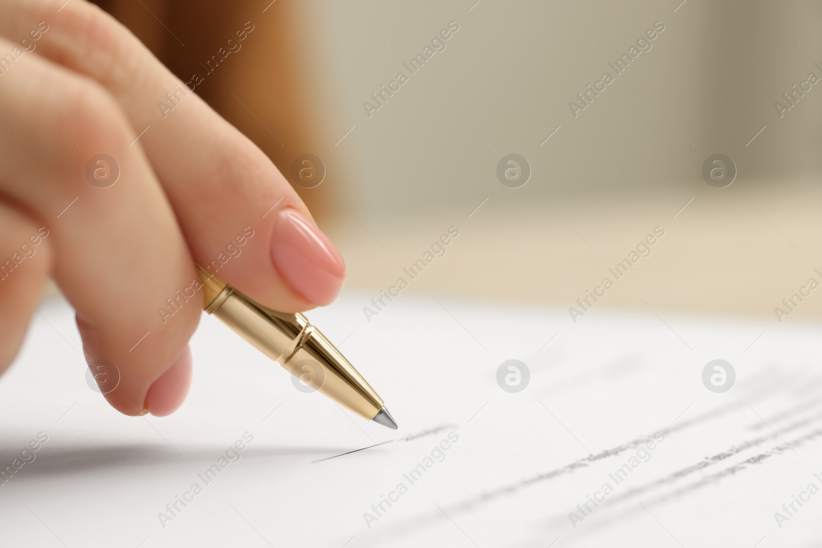 Photo of Woman signing document, closeup view. Space for text