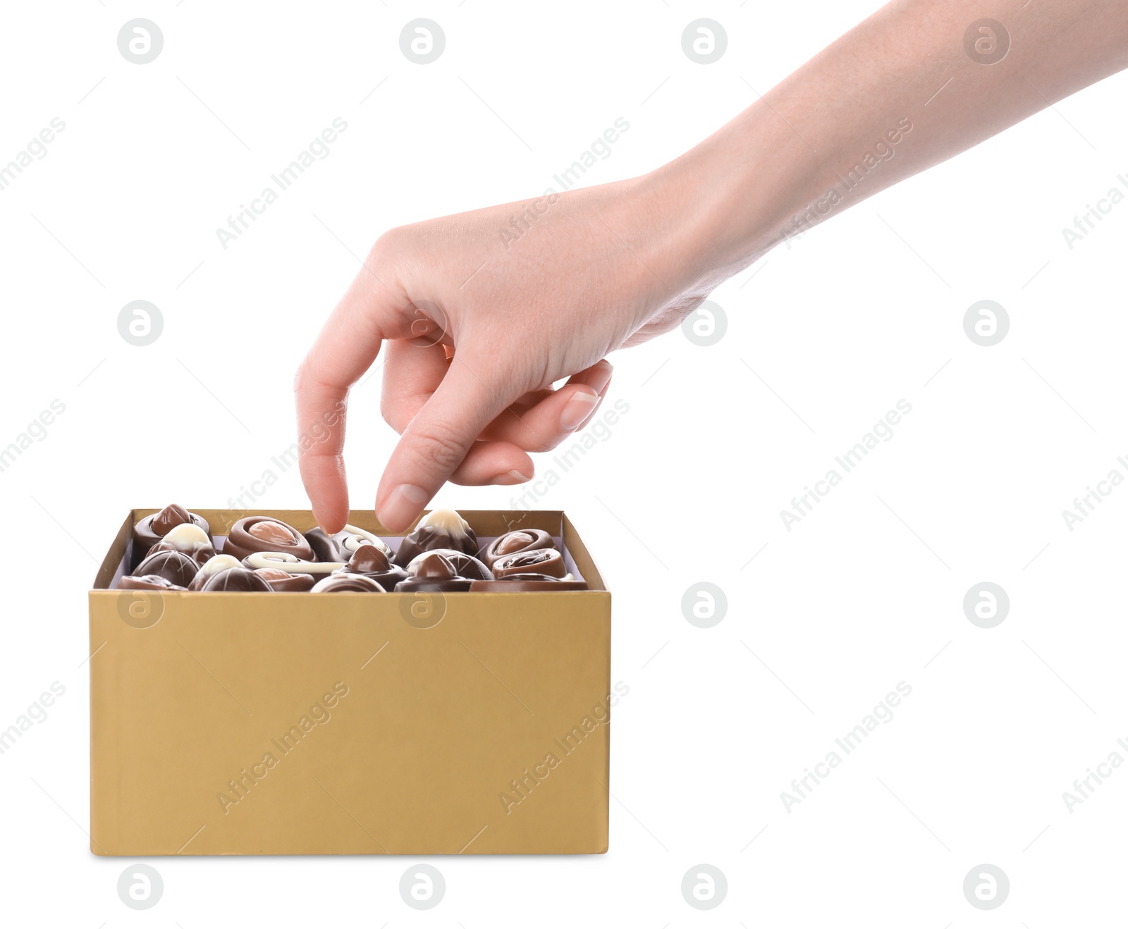 Photo of Woman taking chocolate candy out from box isolated on white, closeup