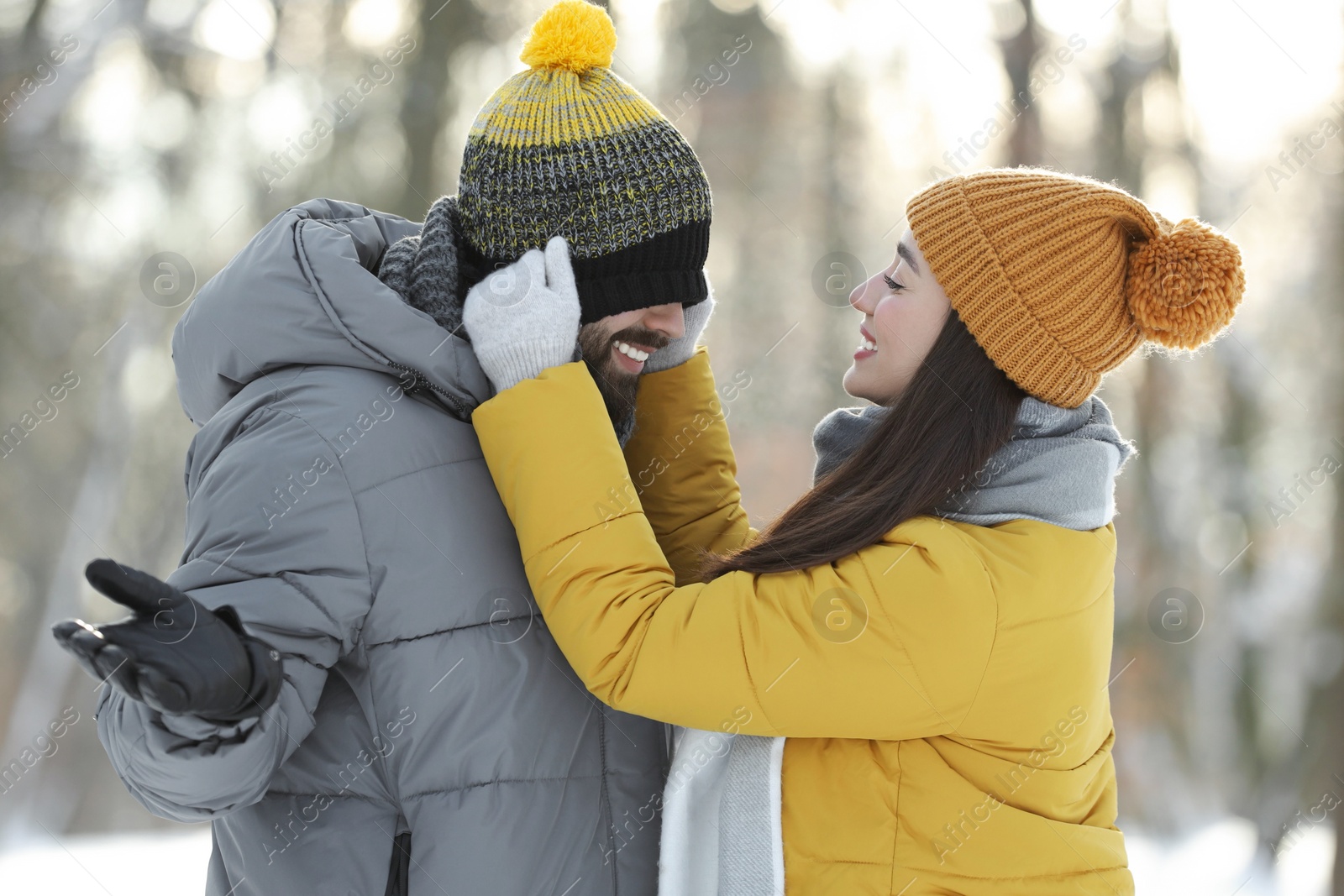 Photo of Happy young couple having fun outdoors on winter day