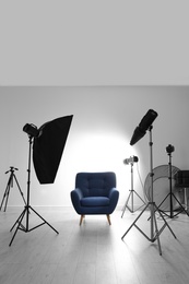 Interior of modern photo studio with professional equipment