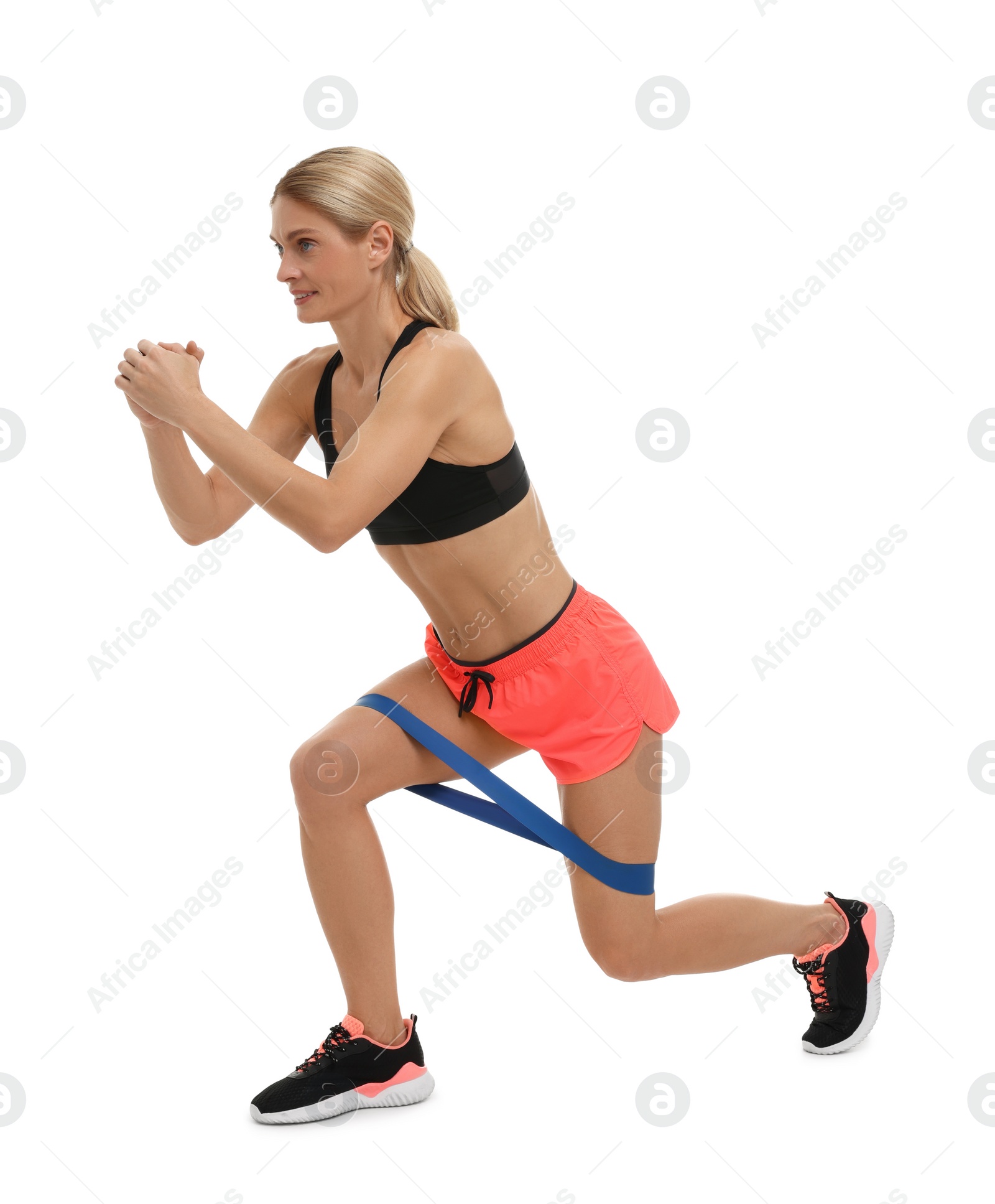 Photo of Woman exercising with elastic resistance band on white background