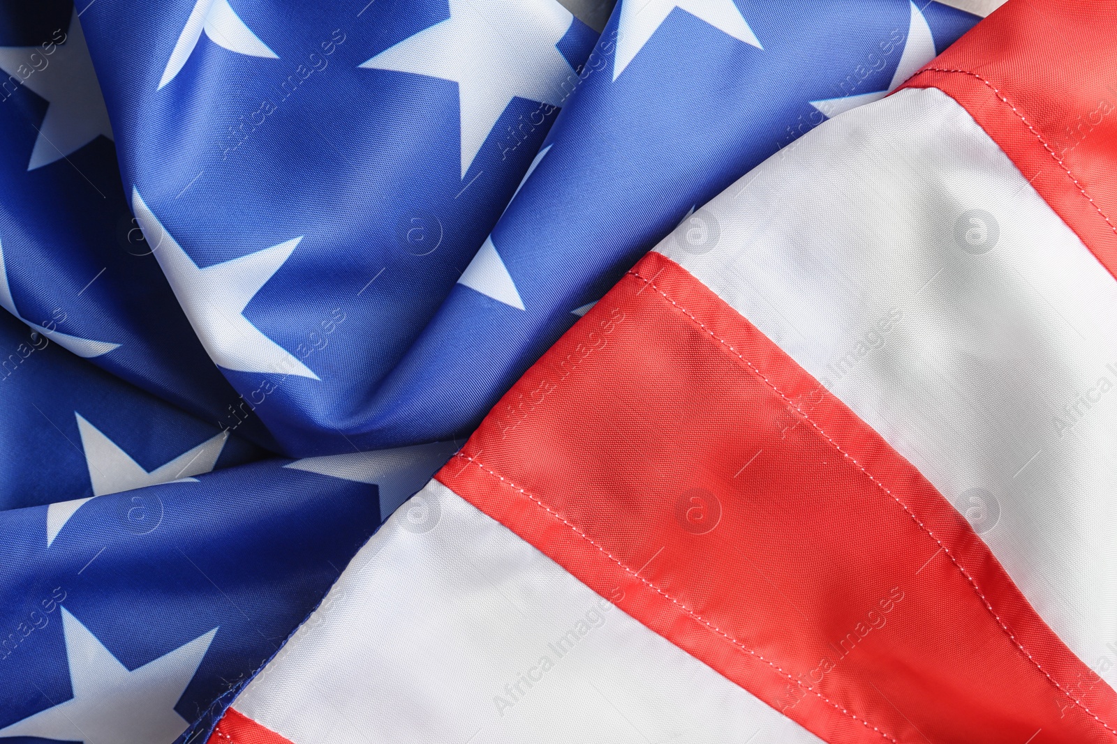 Photo of Colorful USA flag as background, closeup. Happy Independence Day