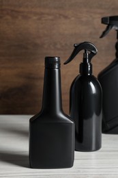 Photo of Car cleaning products on white wooden table