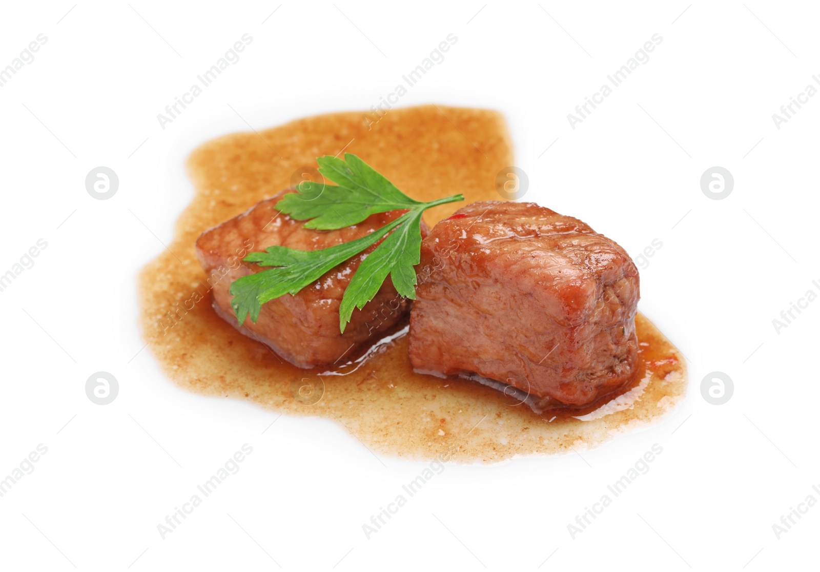 Photo of Pieces of delicious cooked beef and parsley isolated on white. Tasty goulash