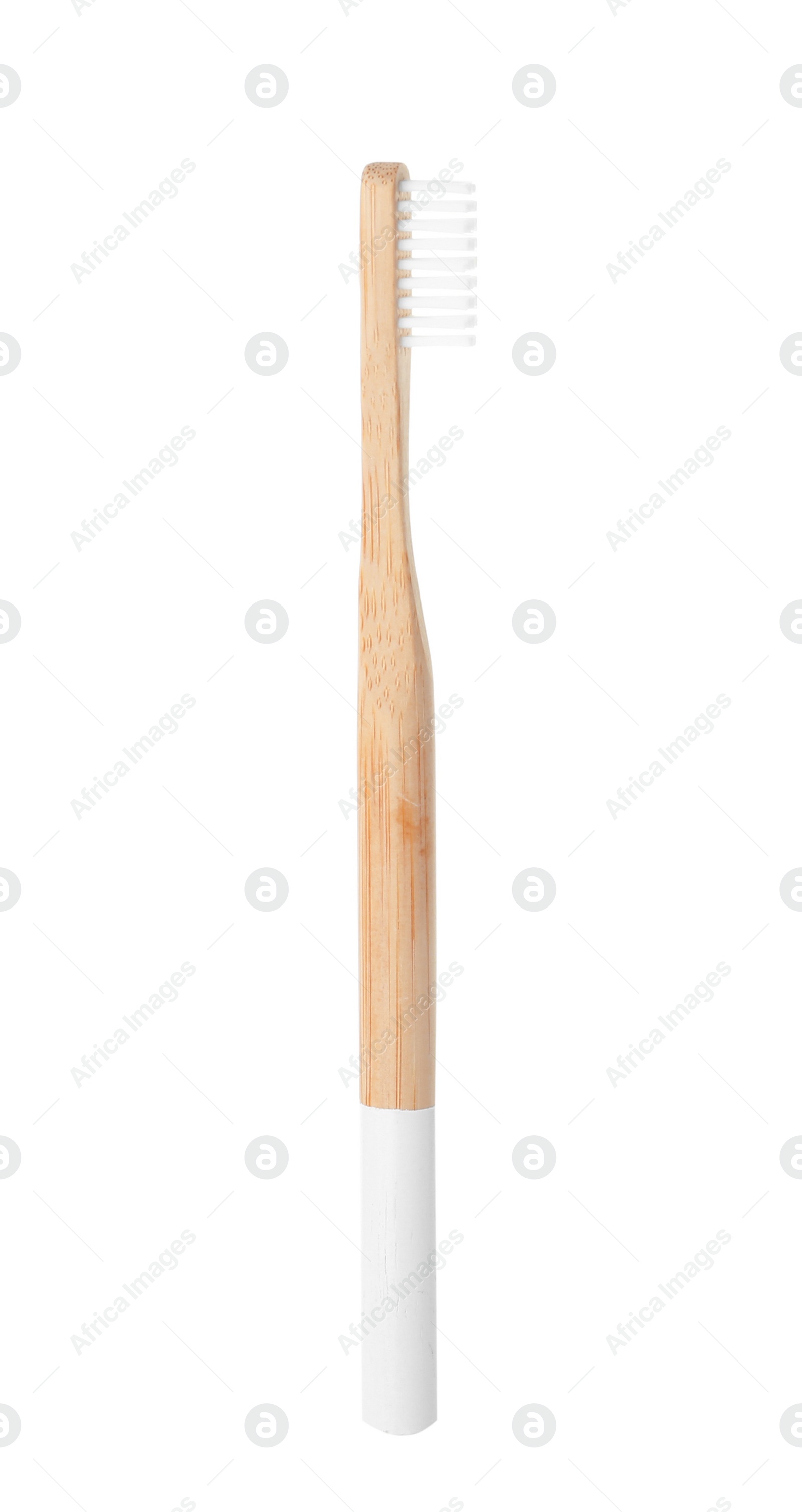 Photo of Bamboo toothbrush on white background. Dental care