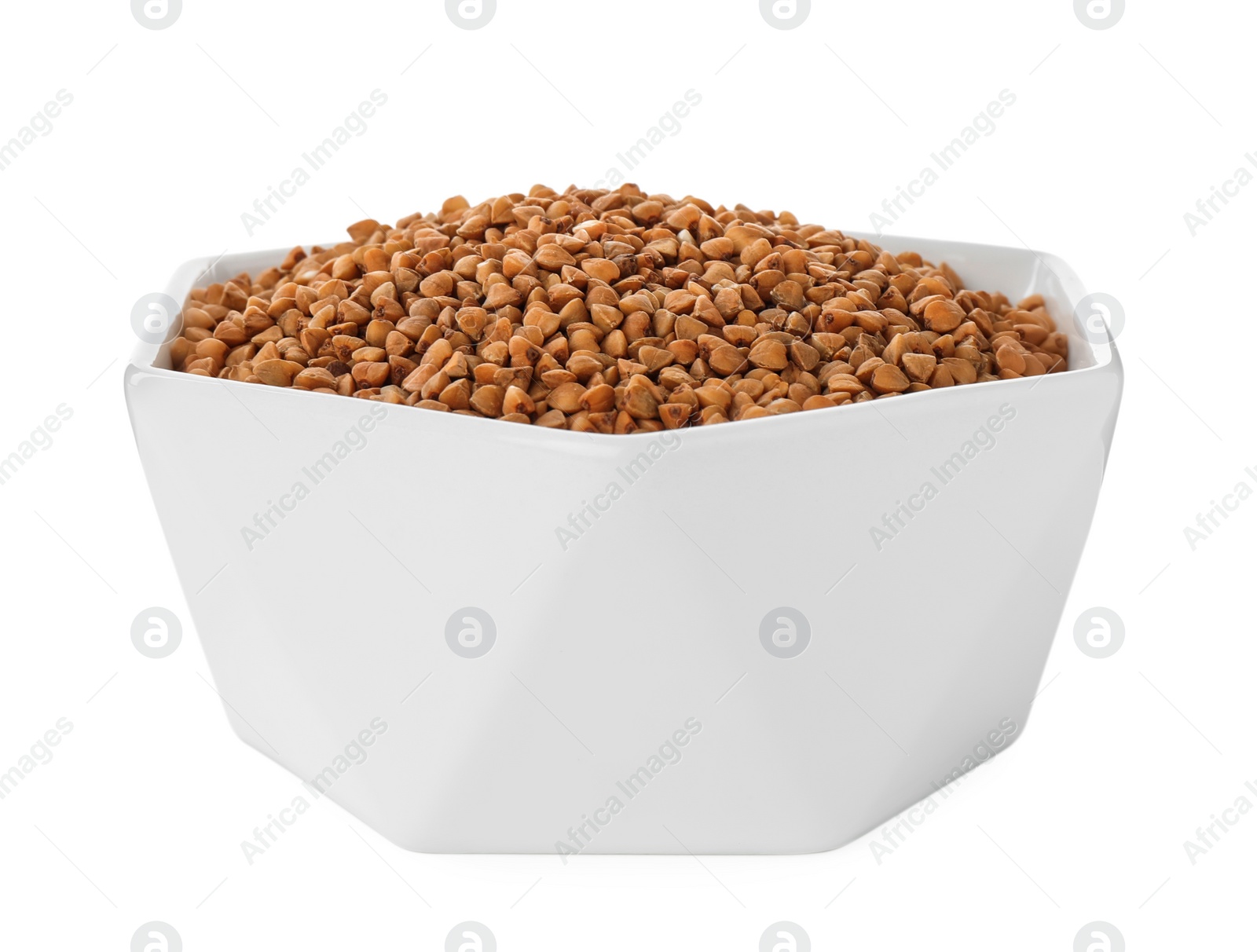 Photo of Uncooked buckwheat in bowl isolated on white