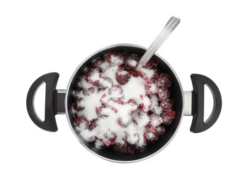 Photo of Pot with cherries and sugar on white background, top view. Making delicious jam