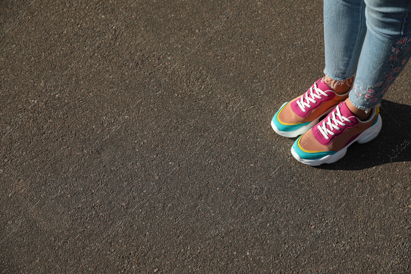 Photo of Woman standing outdoors, closeup with space for text. Choosing way concept.