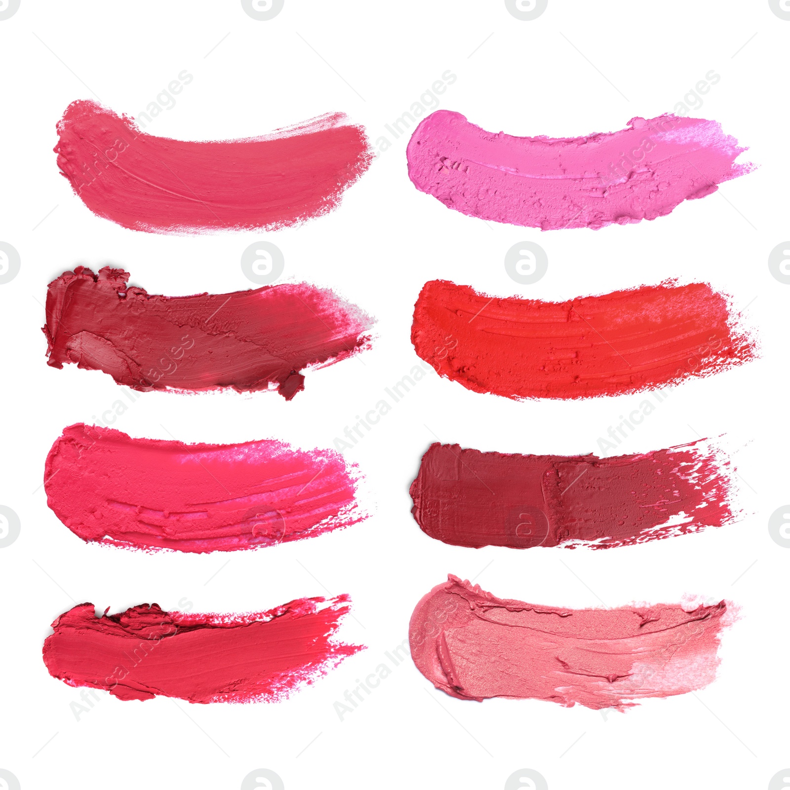 Image of Smears of different beautiful lipsticks on white background, top view