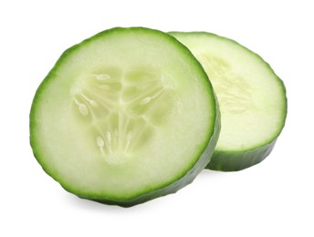 Photo of Slices of fresh cucumber isolated on white