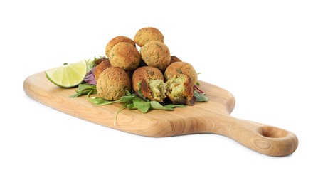 Photo of Delicious falafel balls with herbs and lime on white background