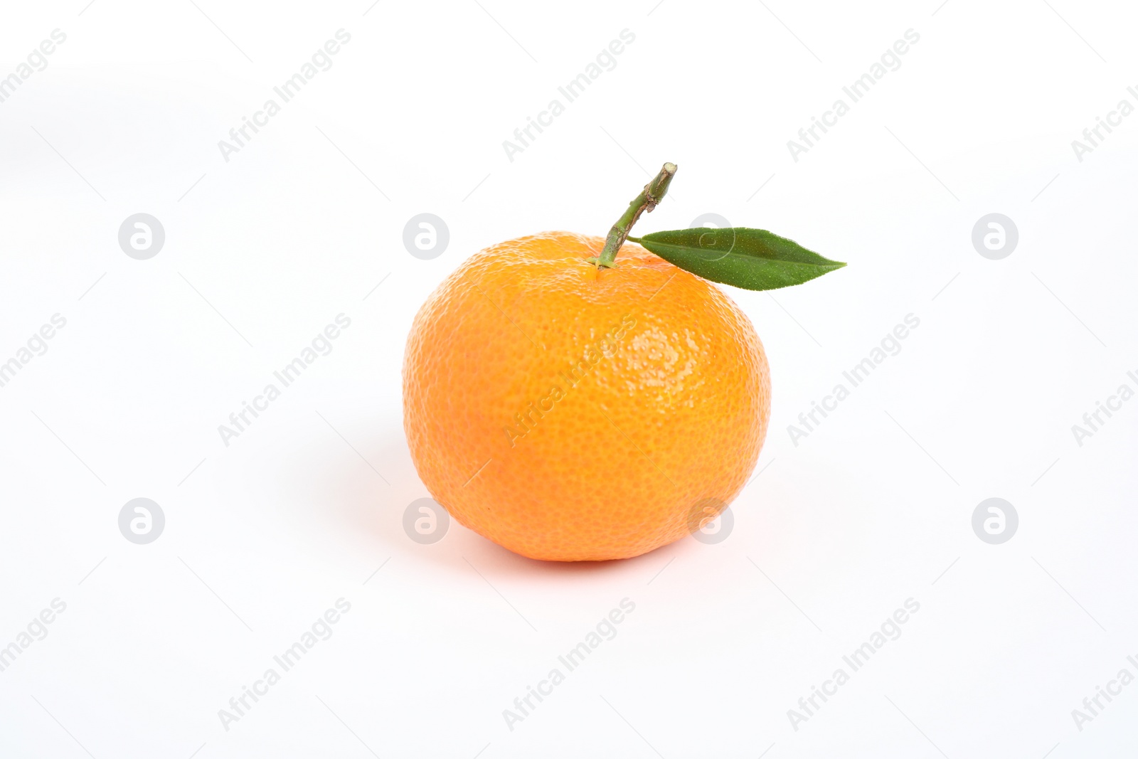 Photo of Fresh ripe tangerine with leaf isolated on white. Citrus fruit