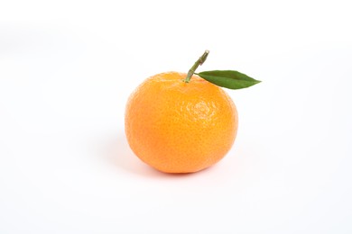 Photo of Fresh ripe tangerine with leaf isolated on white. Citrus fruit