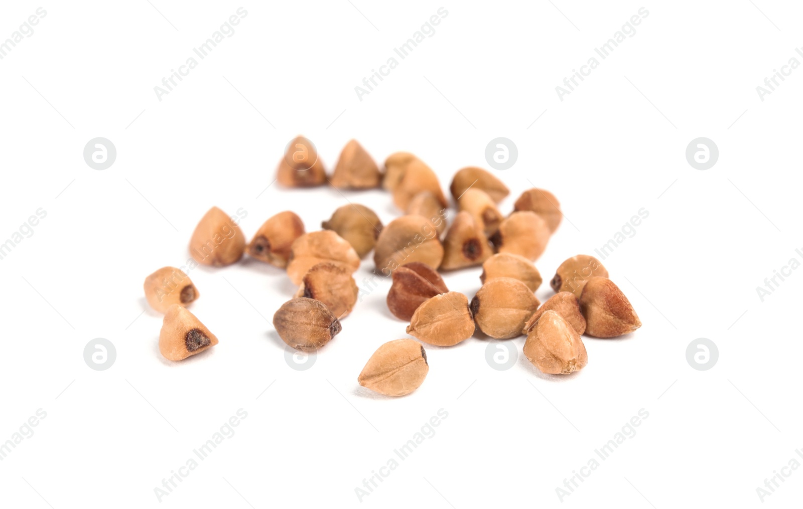 Photo of Uncooked buckwheat on white background. Healthy diet