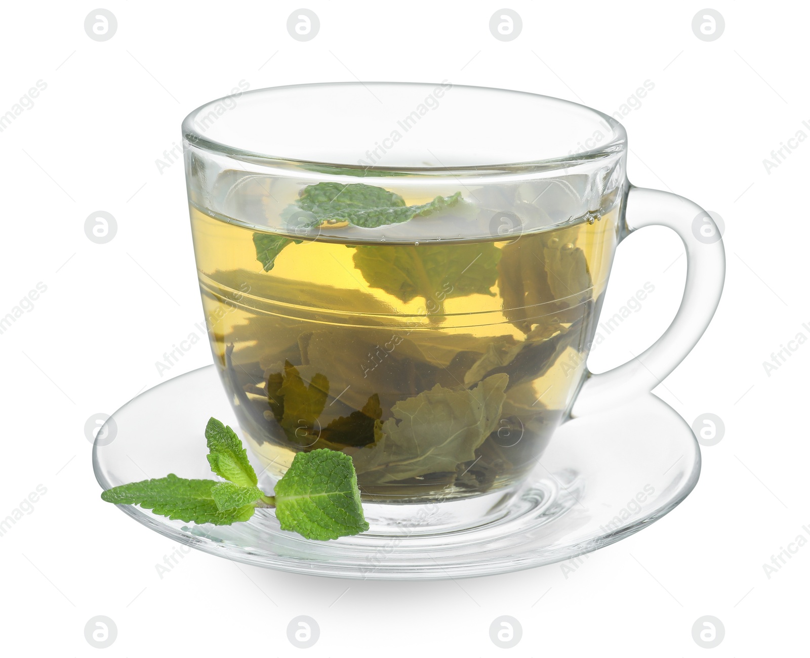 Photo of Fresh green tea in glass cup, mint and saucer isolated on white