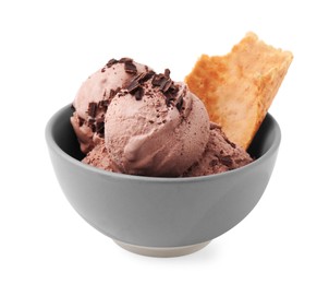 Photo of Tasty ice cream with chocolate chunks and piece of waffle cone in bowl isolated on white