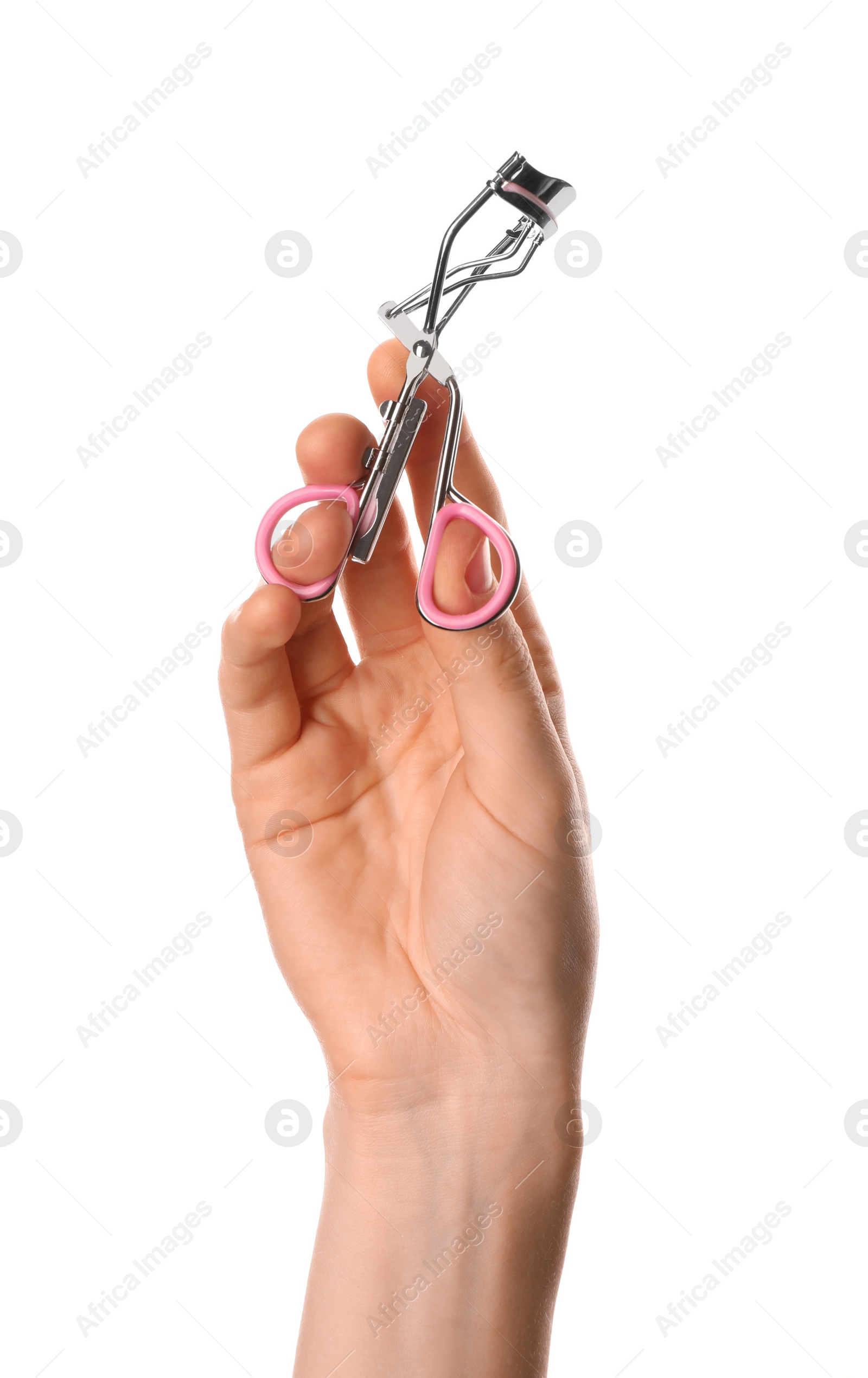 Photo of Woman holding eyelash curler on white background, closeup. Makeup tool