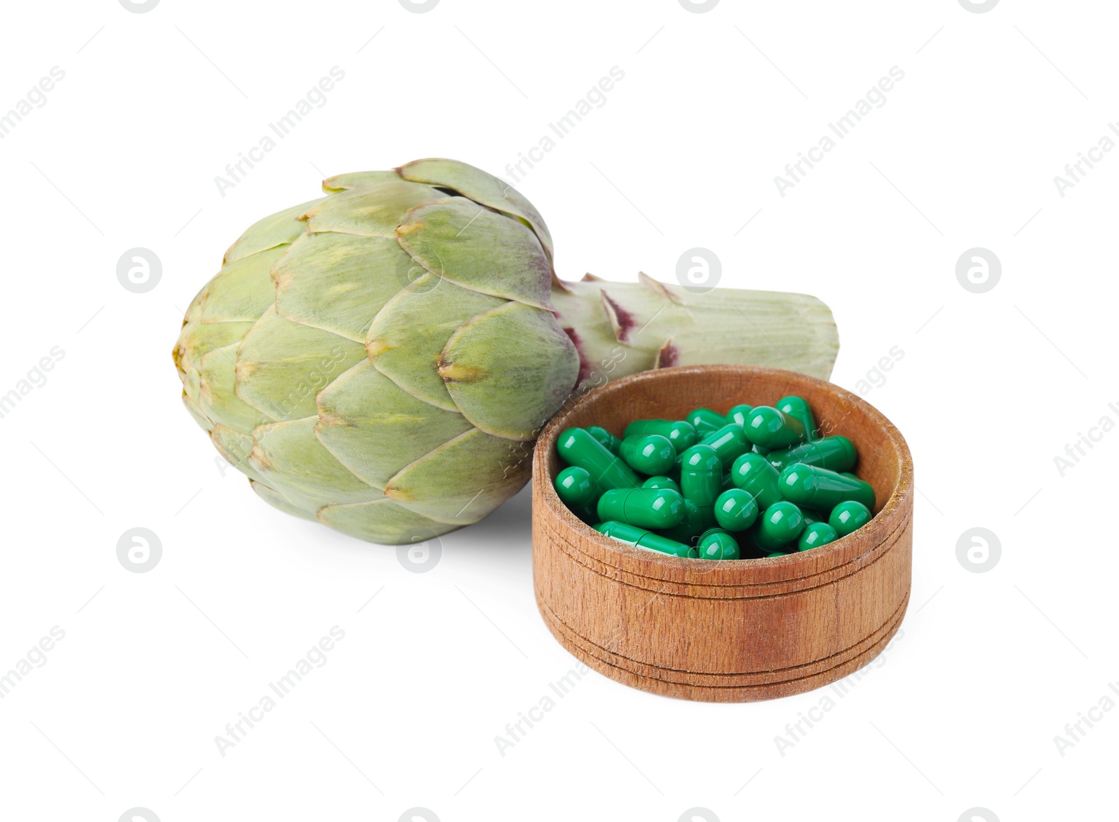 Photo of Fresh artichoke and pills isolated on white