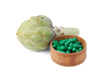 Fresh artichoke and pills isolated on white