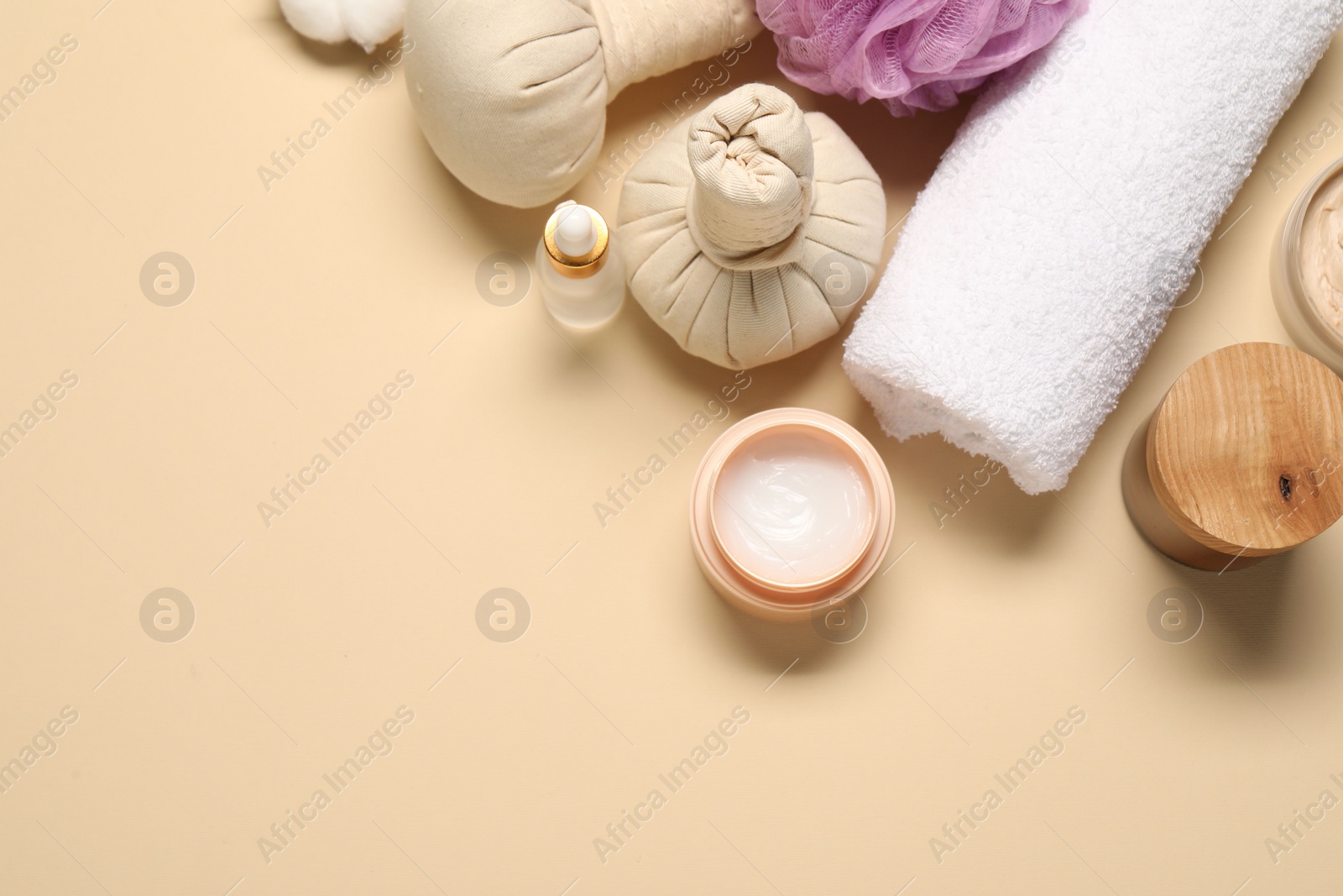 Photo of Bath accessories. Flat lay composition with personal care products on beige background, space for text