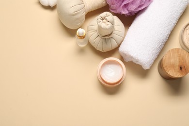 Bath accessories. Flat lay composition with personal care products on beige background, space for text