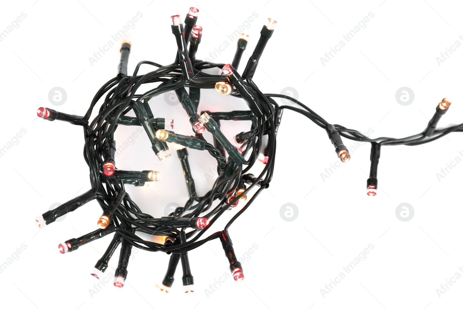 Photo of Beautiful Christmas lights on white background, top view