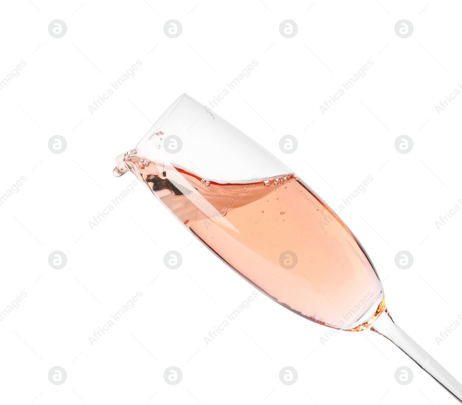 Photo of Glass of rose champagne isolated on white