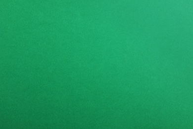 Photo of Abstract green background, top view. Colorful paper