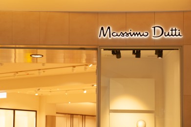 Photo of Warshaw, Poland - May 14, 2022: Massimo Dutti fashion store in shopping mall