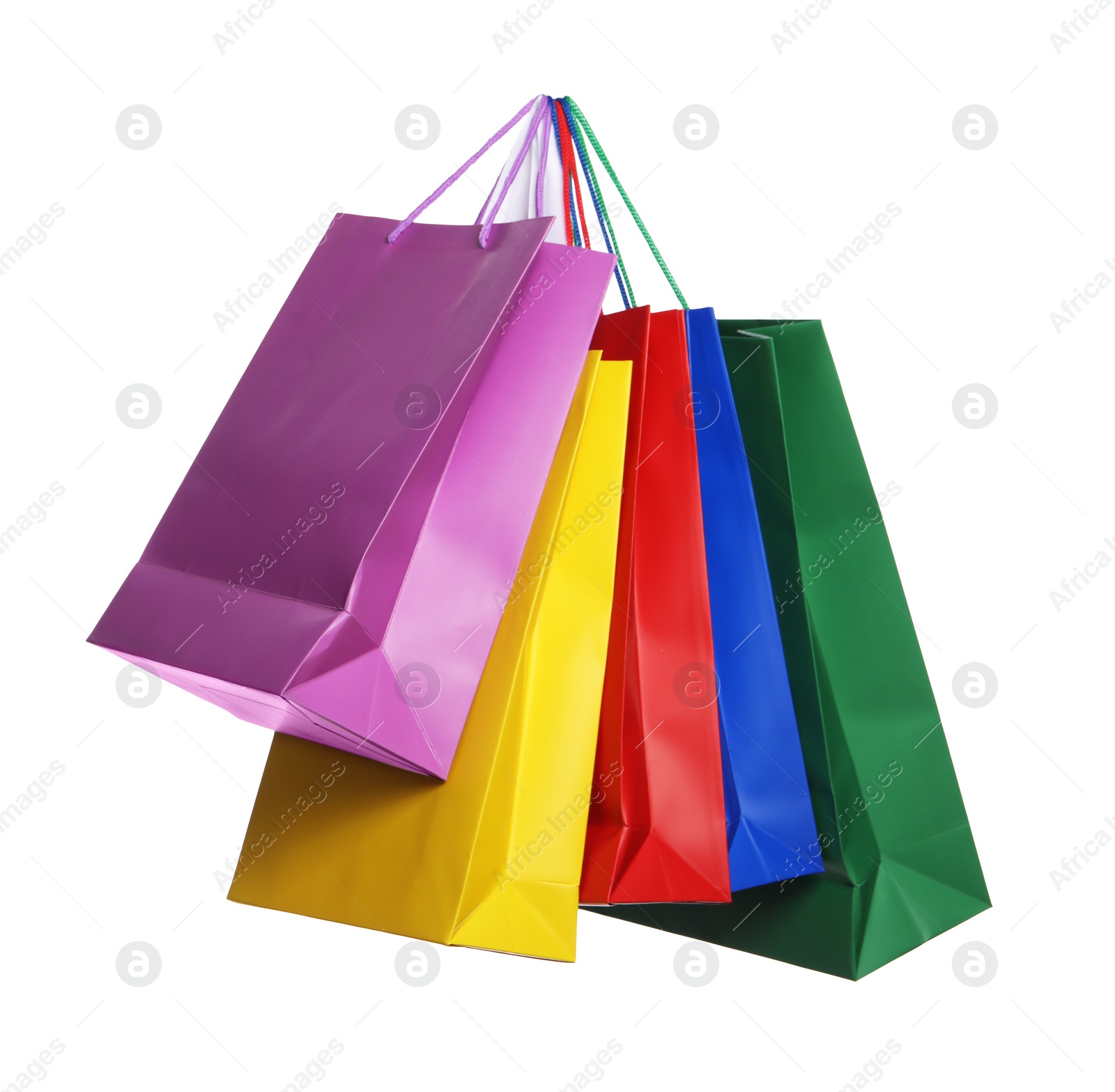 Photo of Colorful paper shopping bags isolated on white