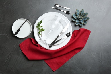 Photo of Elegant table setting on grey background, flat lay
