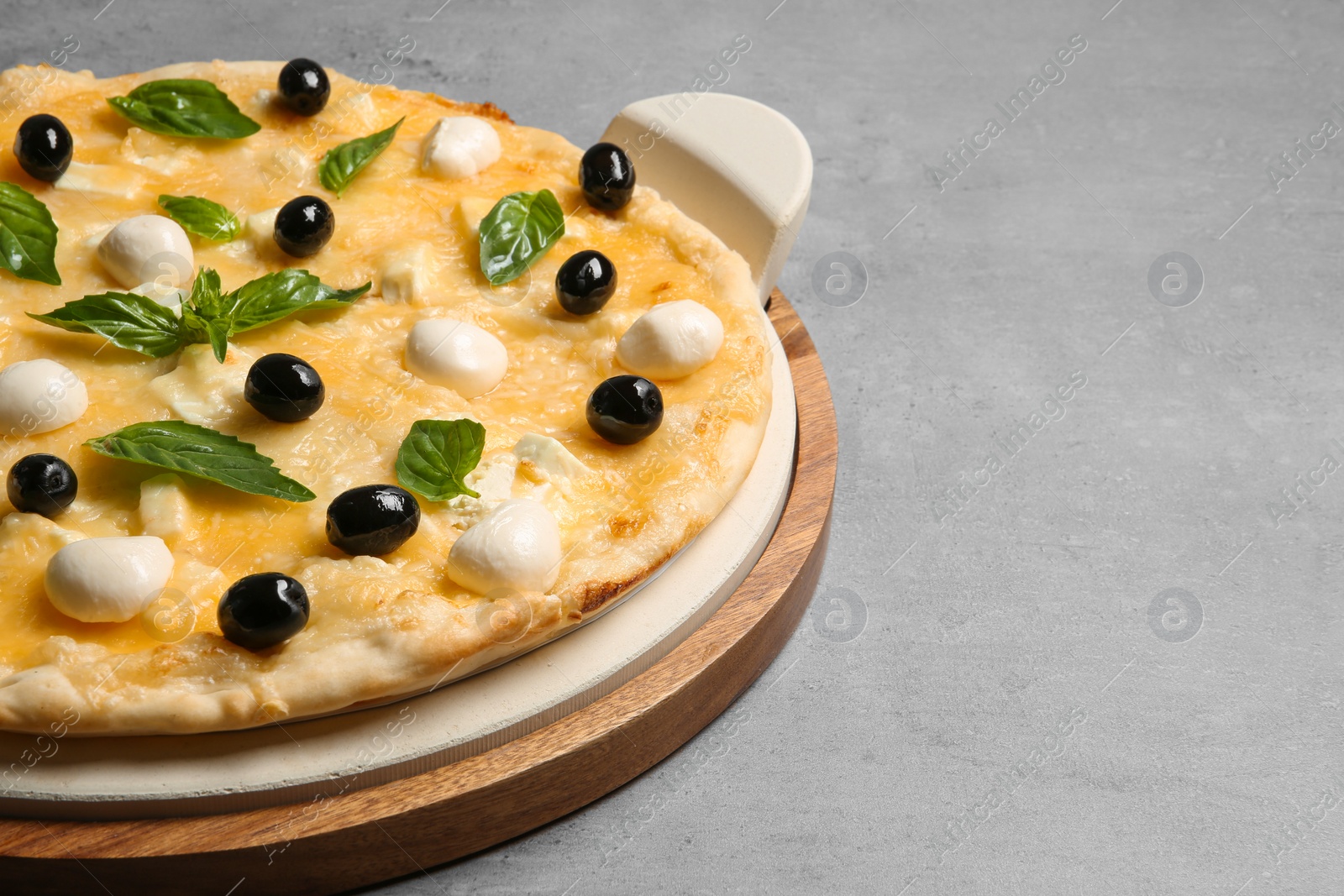 Photo of Fresh tasty homemade pizza on table, closeup