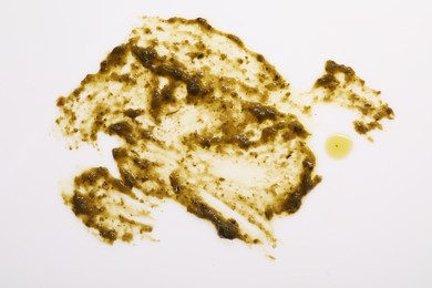 Smear of sauce on white background, top view