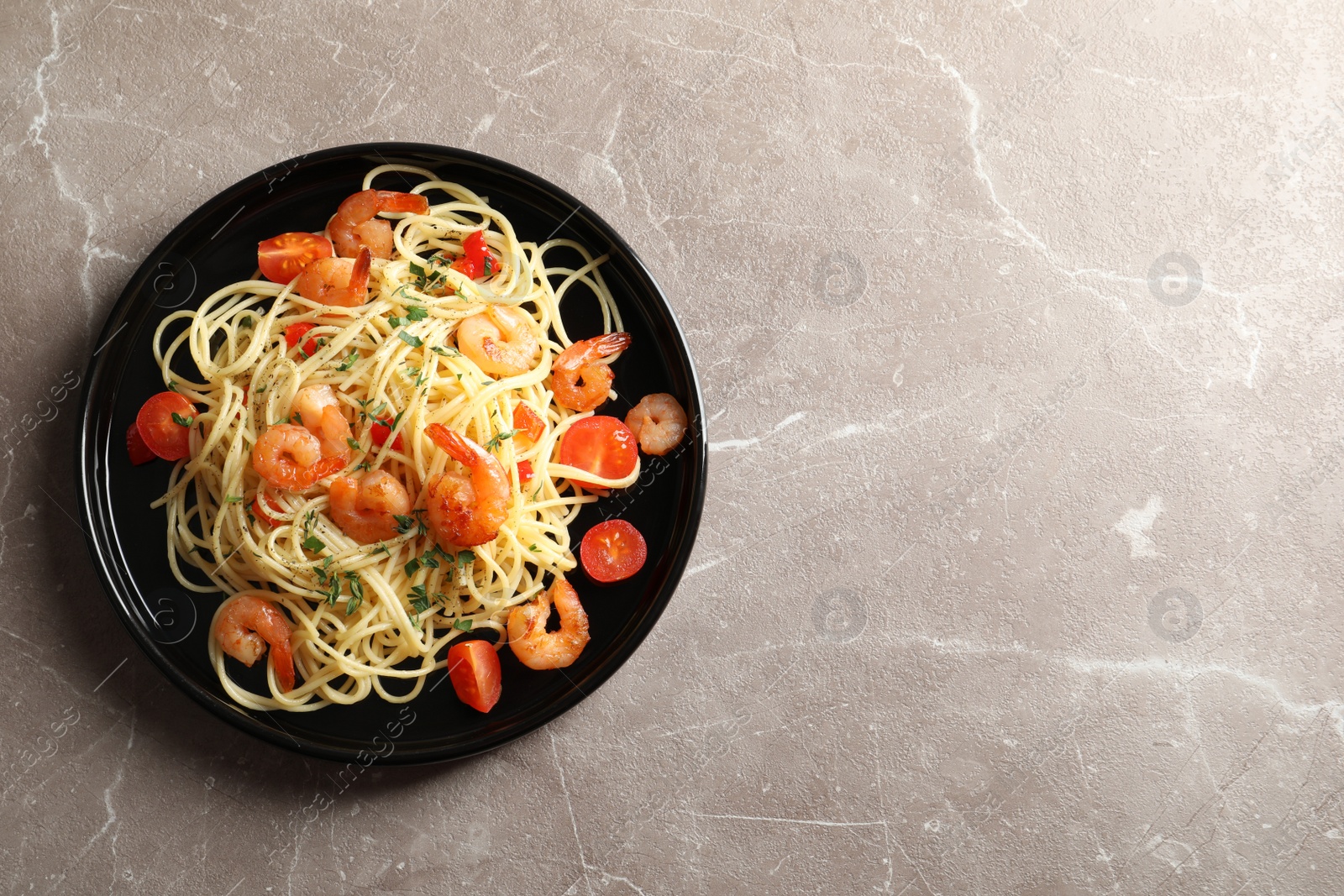 Photo of Delicious pasta with shrimps on plate