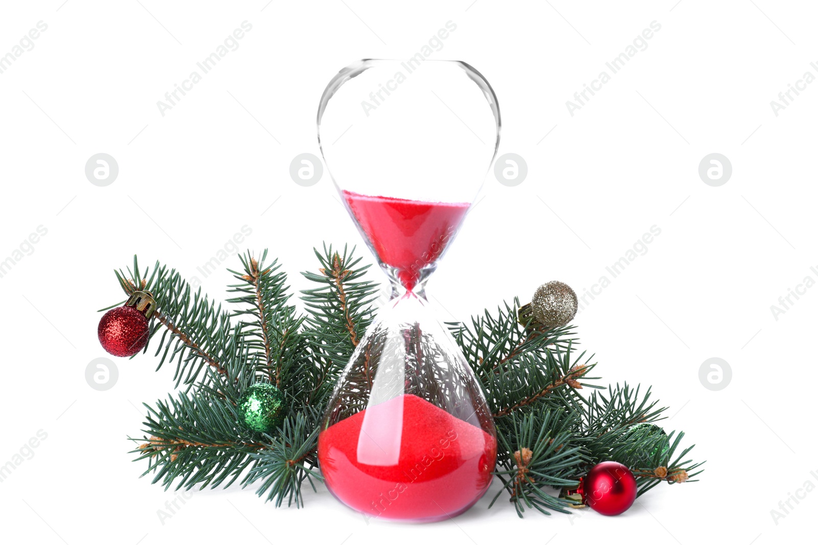 Photo of Hourglass, fir tree twigs and decor on white background. Christmas countdown