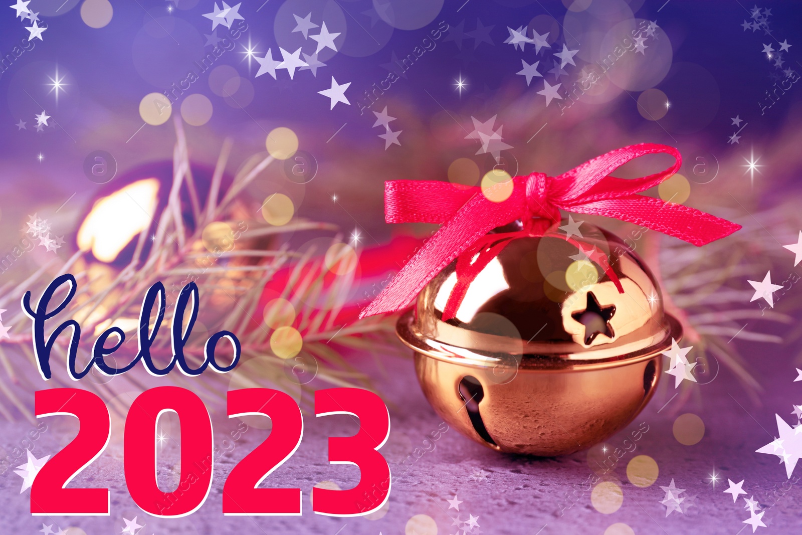 Image of Hello 2023. Golden sleigh bells and fir branches on table, closeup