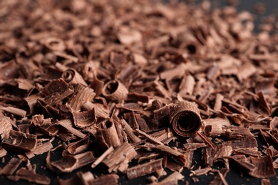 Pile of tasty chocolate curls as background