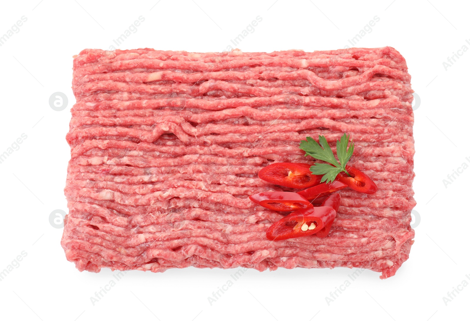 Photo of Raw ground meat, chili pepper and parsley isolated on white, top view