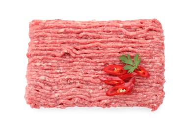 Raw ground meat, chili pepper and parsley isolated on white, top view