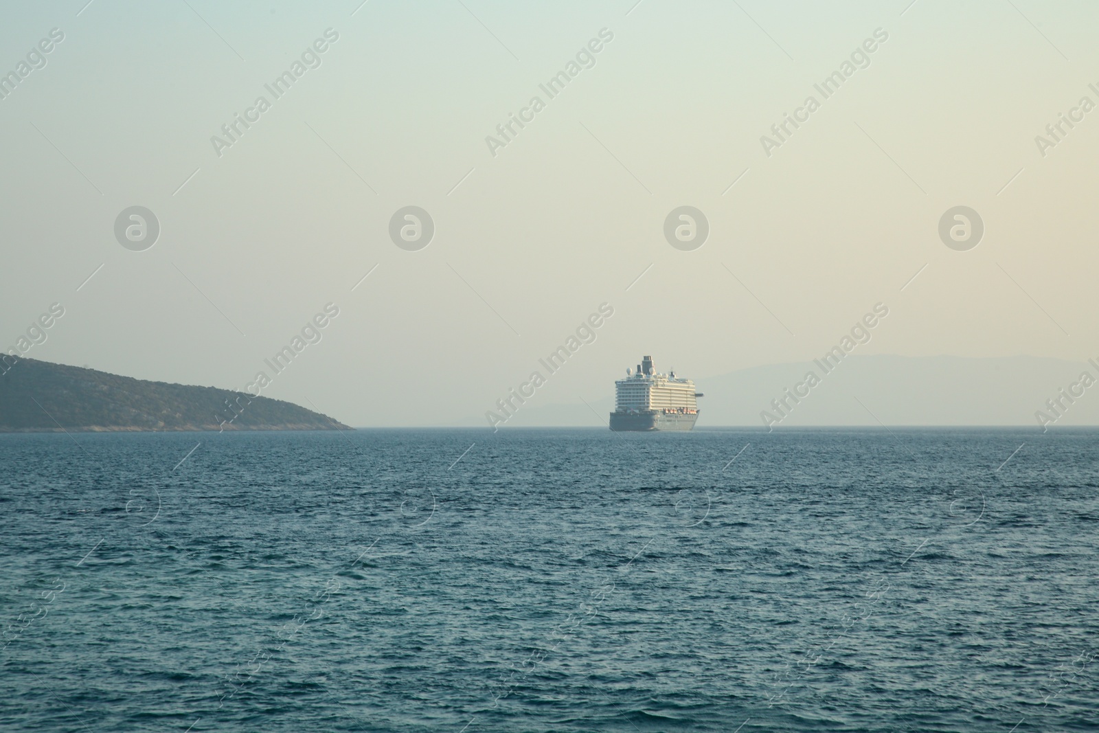 Photo of Picturesque view of calm sea with big ferry
