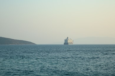 Photo of Picturesque view of calm sea with big ferry