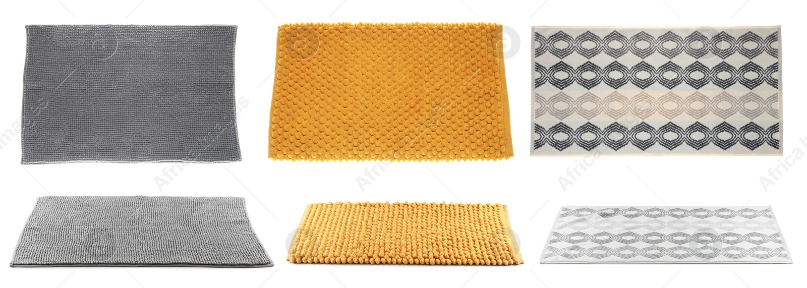 Image of Set with soft bath mats on white background. Banner design