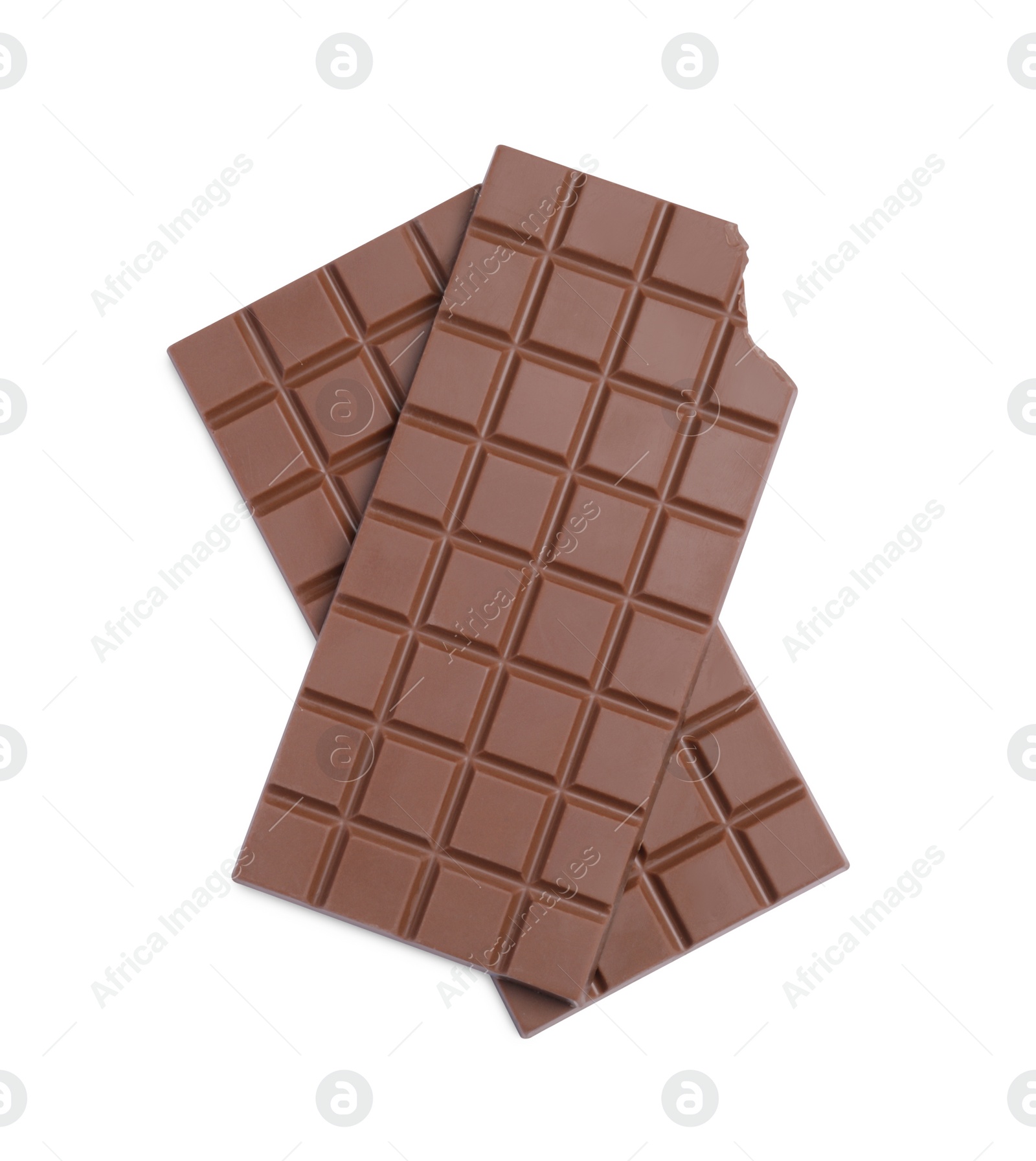 Photo of Delicious milk chocolate bars on white background, top view