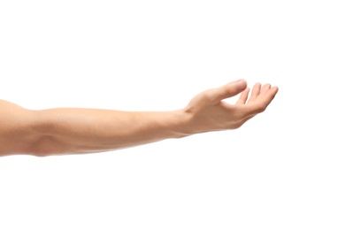 Photo of Young man held out hand on white background, closeup