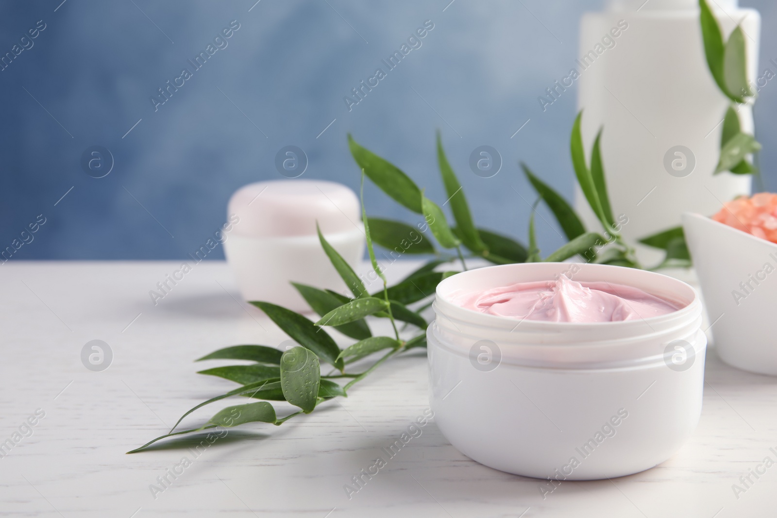Photo of Jar of body care product on table. Mockup for design