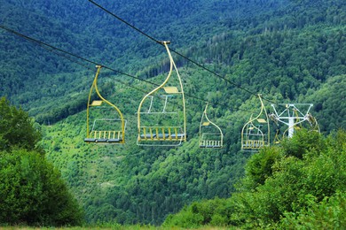 Chairlift with seats at beautiful mountain resort