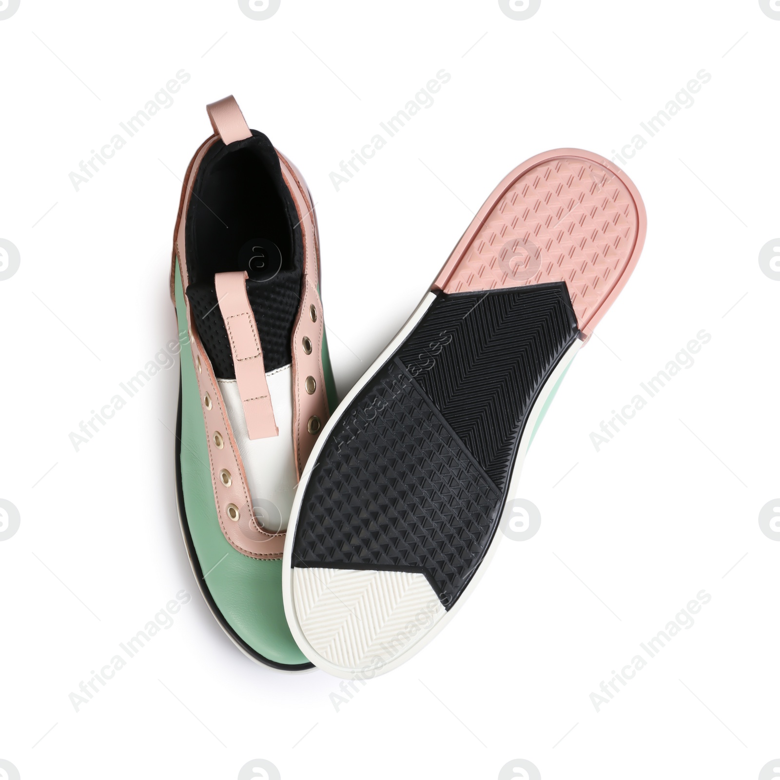 Photo of Stylish modern shoes on white background, top view