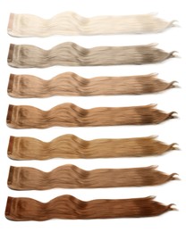 Image of Strands of different beautiful hair on white background