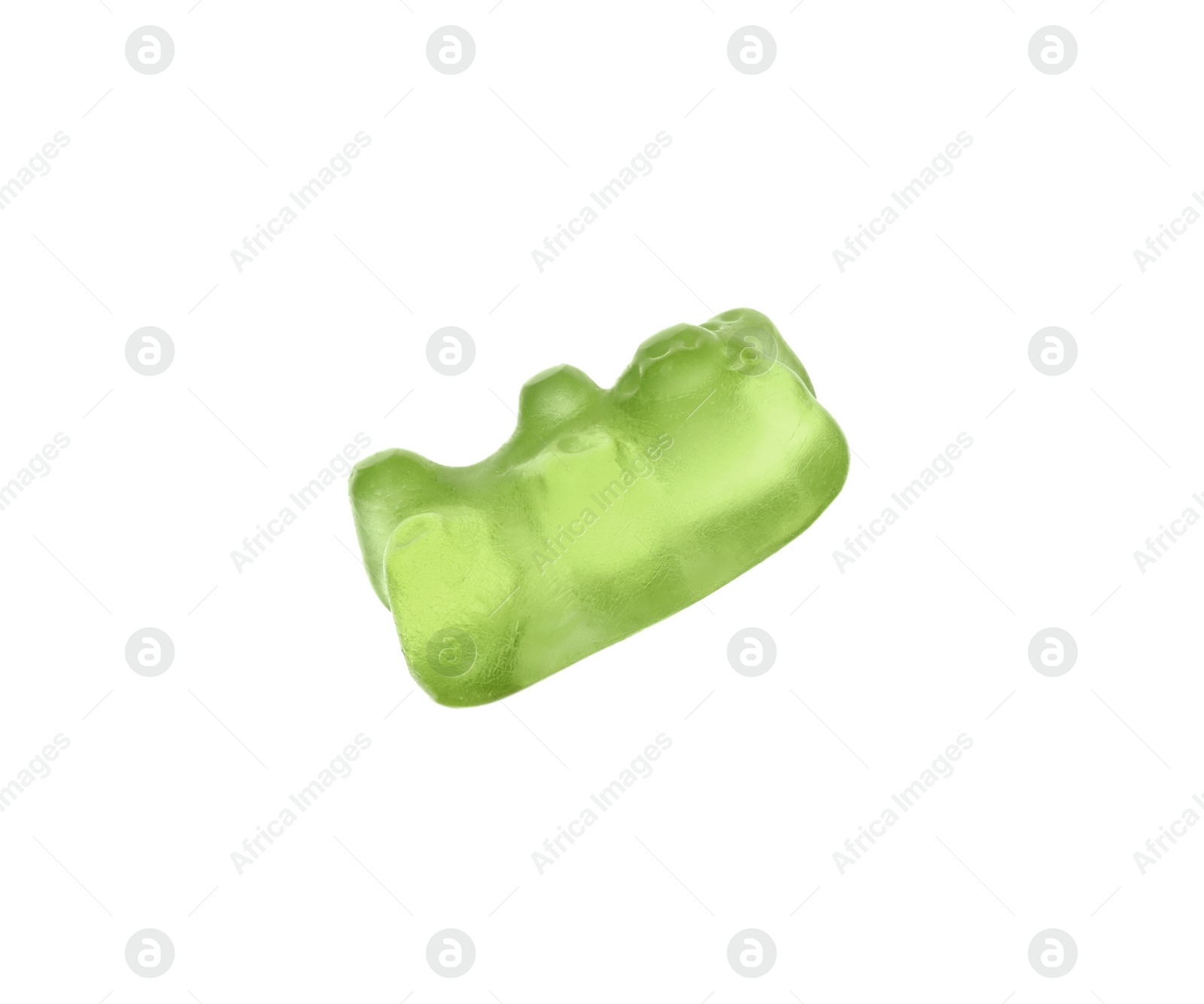 Photo of Delicious green jelly bear on white background