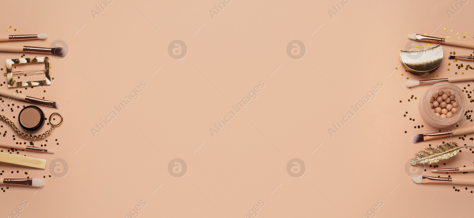 Photo of Flat lay composition with makeup brushes on beige background. Space for text